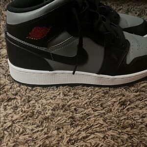 Jordan Black and Gray Sneakers with Red Accent